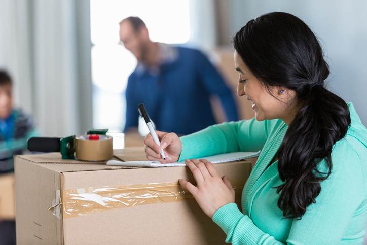 Mom makes list while preparing to move to new home