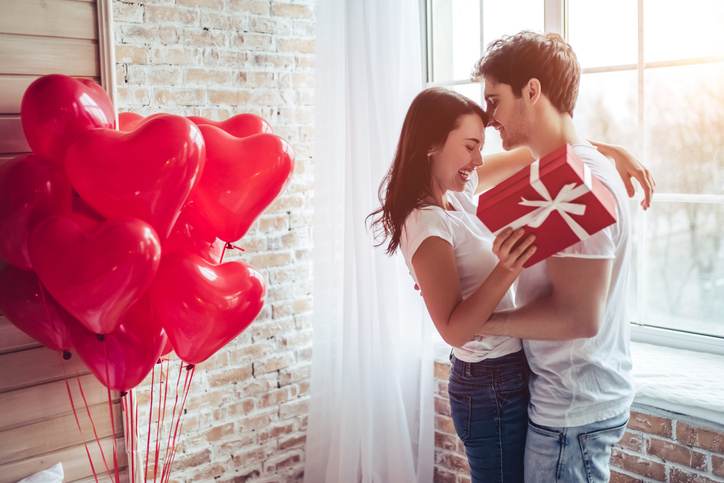 Couple in bedroom.